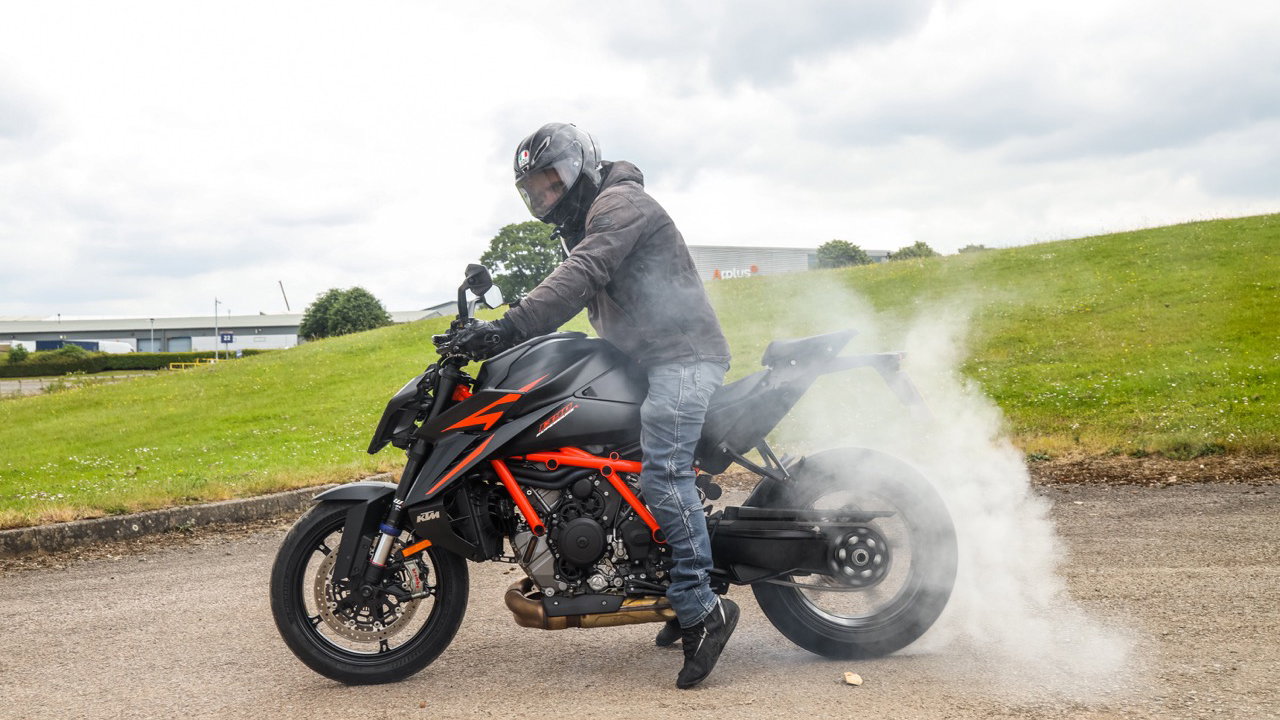 A motorcycle performing a burnout